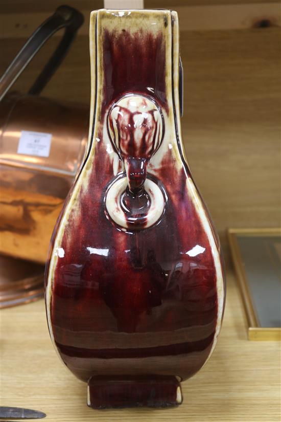 A Chinese sang-de-boeuf glazed hu vase